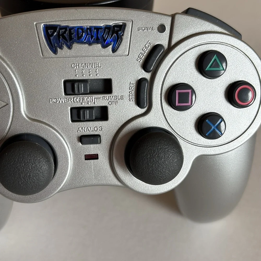 Silver Pelican Predator wireless controller for the PlayStation 2 (PS2)